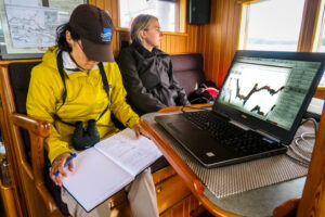 Dr. Sato and a summer undergraduate student, Taryn Scarff, aboard ship surveying important foraging habitats for resident killer whales. Credit: A.W. Trites/University of British Columbia